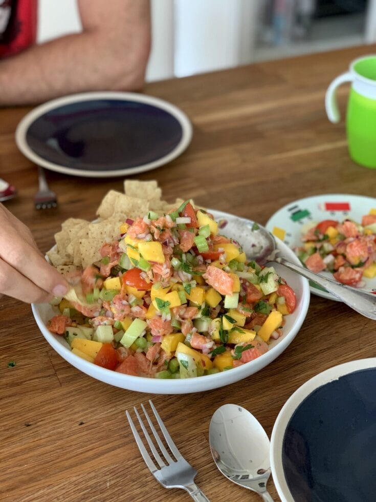 salmon ceviche action shot